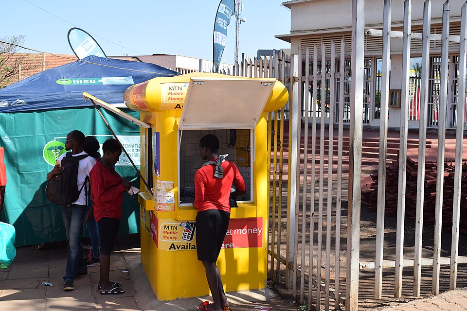 African mobile money kiosk for farm and market payments in Uganda